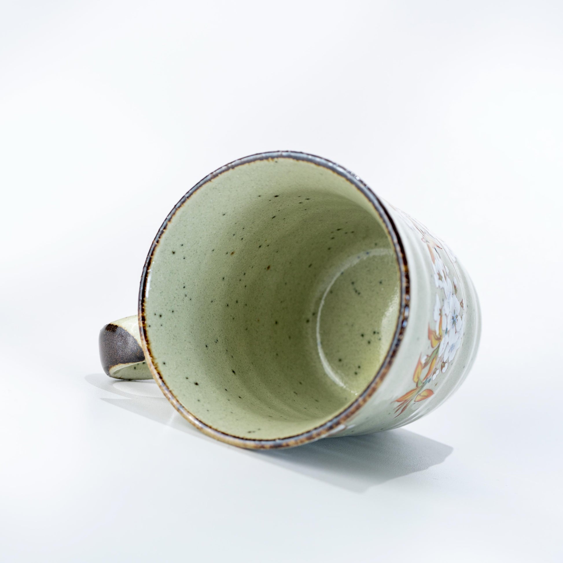 Top view of Kutani ware mug showing interior glaze and cup opening