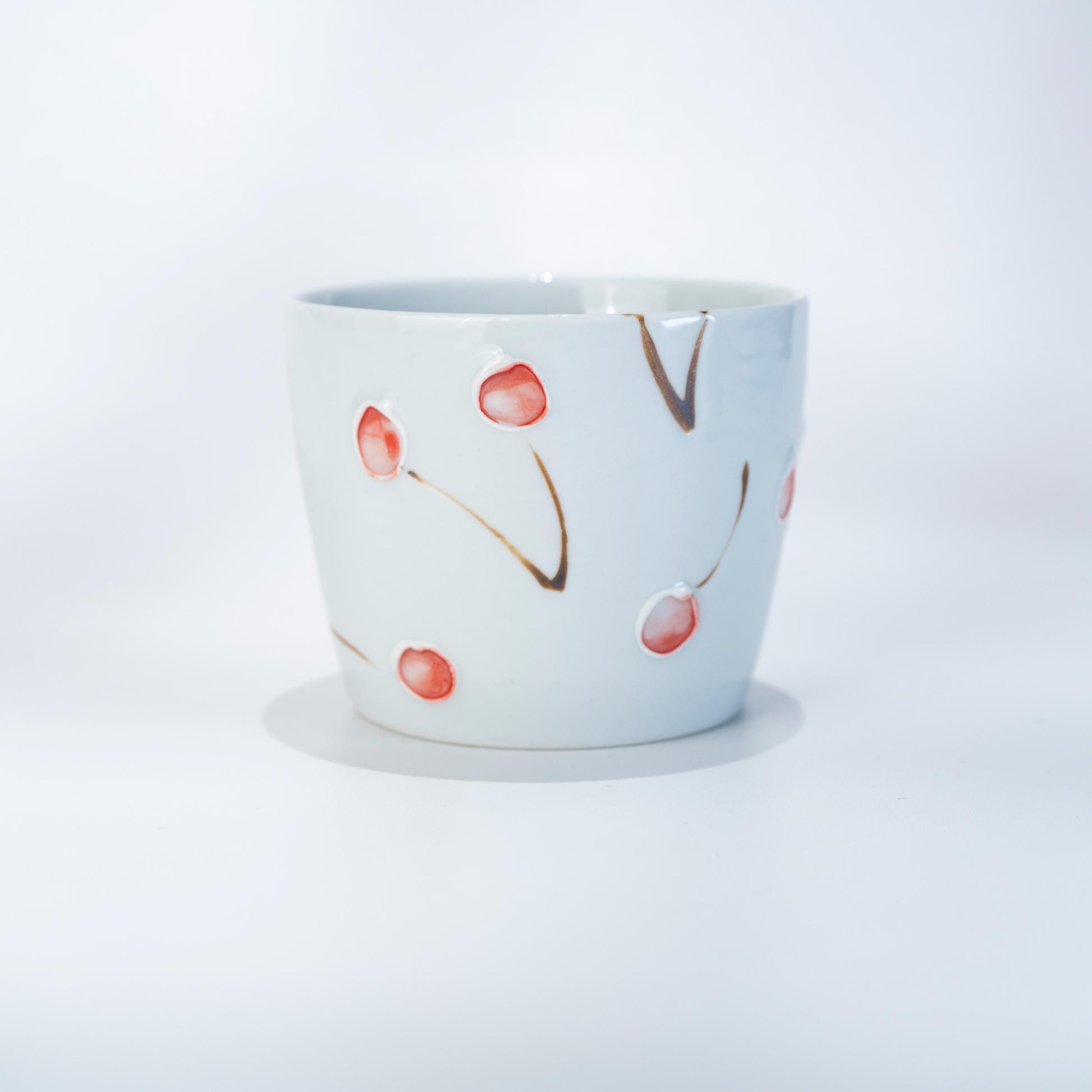 Arita Hasami cherry yunomi tea cup in hand-painted Japanese porcelain