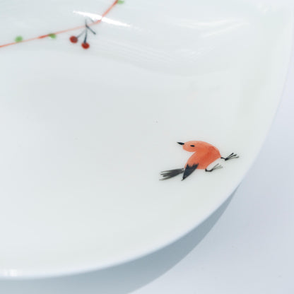 Front view of Japanese leaf-shaped plate with bird motif