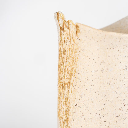 Front view of white Shigaraki ikebana vase with gold accent