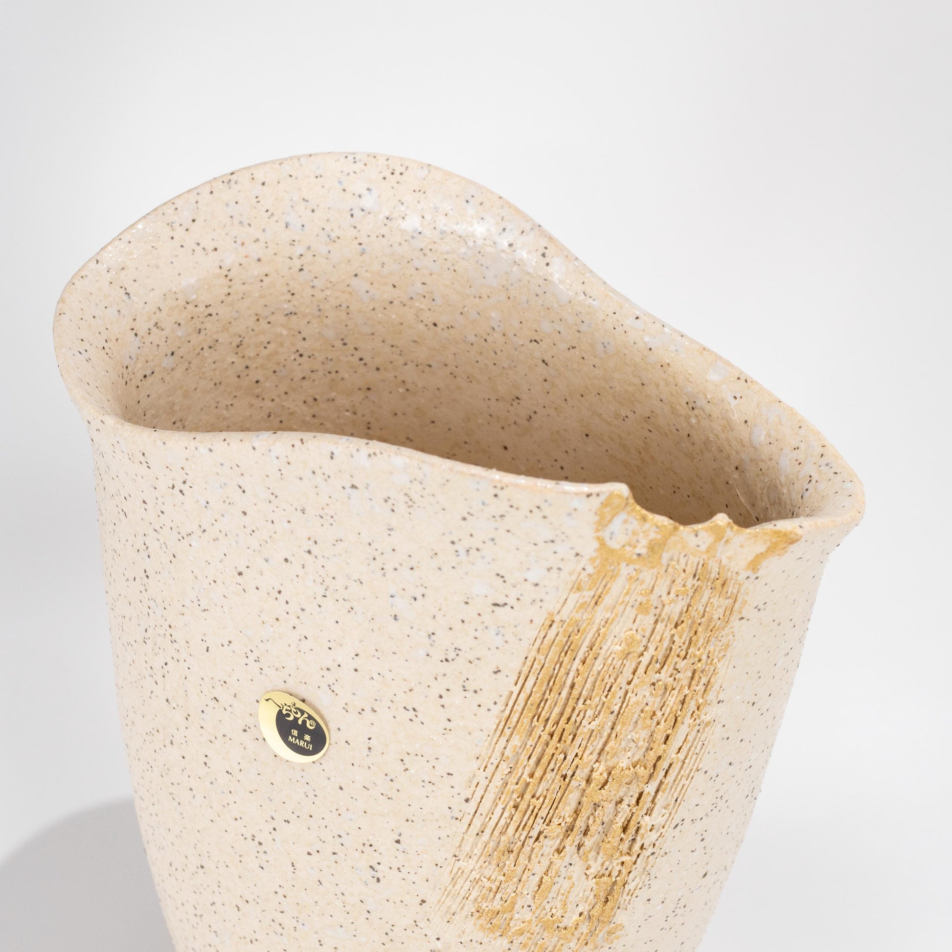 Full body view of tall Shigaraki white vase for ikebana