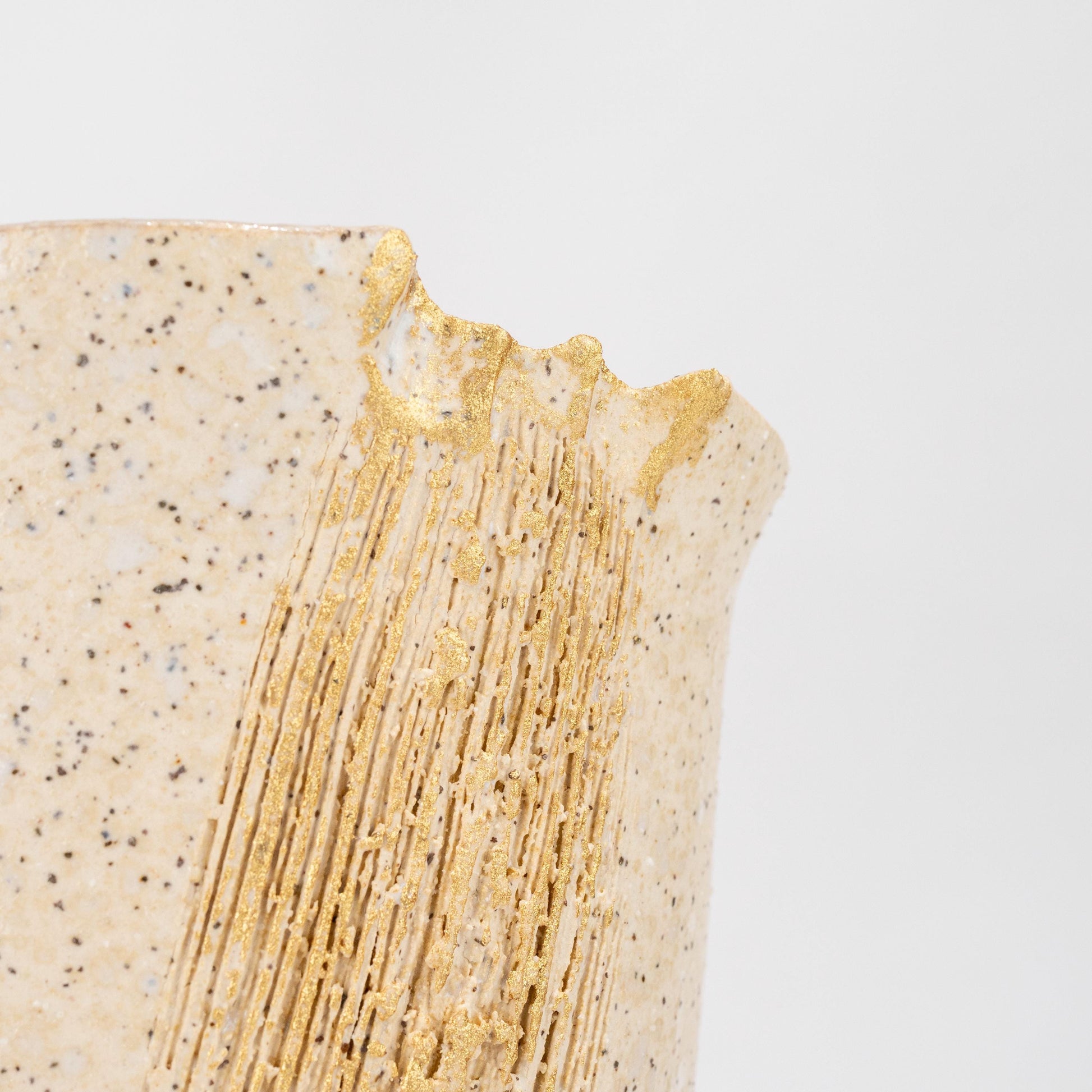 Detail of gold accent on white Shigaraki ikebana vase