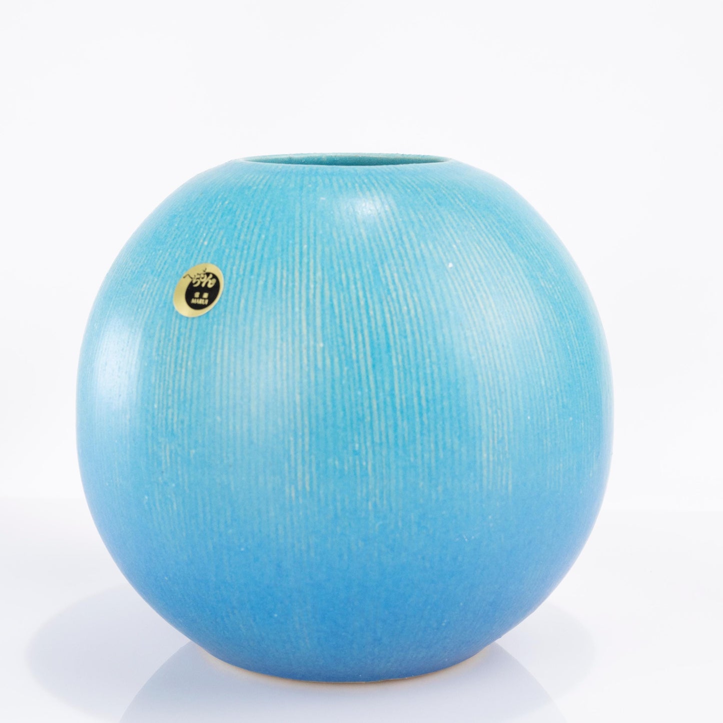 Shigaraki turquoise ikebana vase in handmade Japanese stoneware