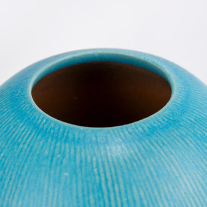 Top opening of a Shigaraki turquoise stoneware ikebana vase