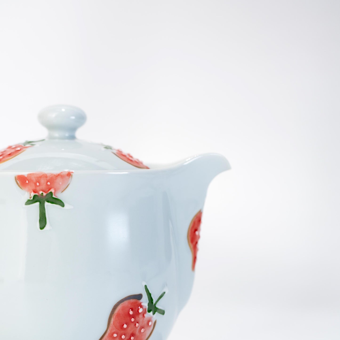 Side profile of Japanese strawberry teapot