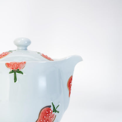 Side profile of Japanese strawberry teapot