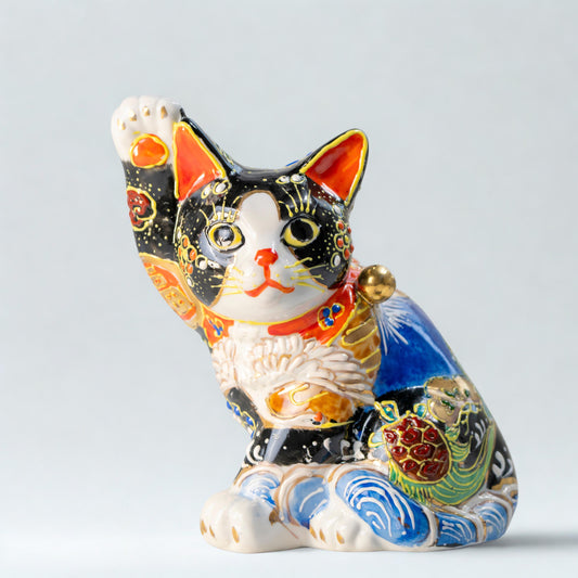 Kutani black Maneki Neko with Mount Fuji on white background