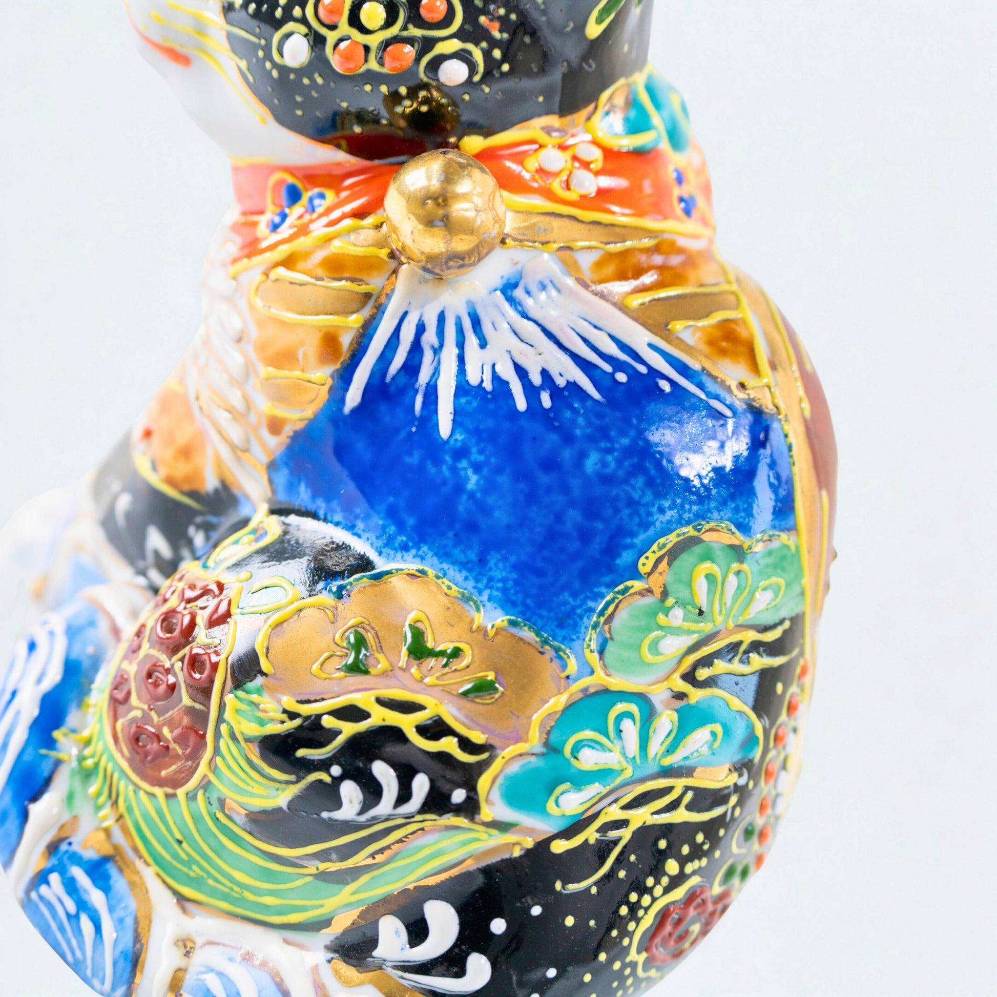 Back view of Japanese porcelain lucky cat