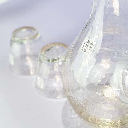 Side view of amber glass carafe with built-in ice pocket