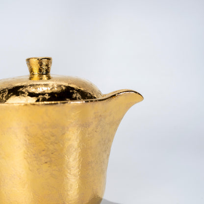 Close-up of gold glaze finish on Arita porcelain cup