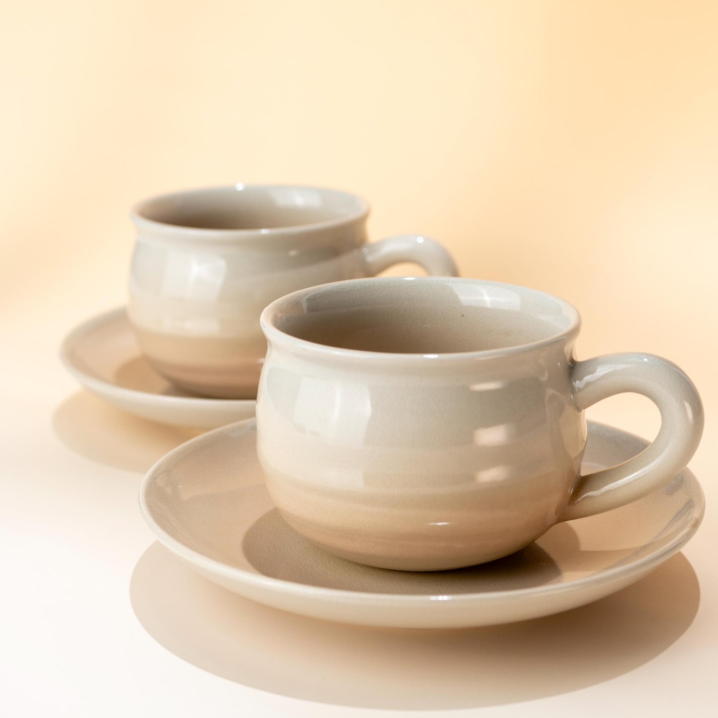 Hagi yaki coffee cup and saucer set with soft pink crackle glaze, handmade in Japan