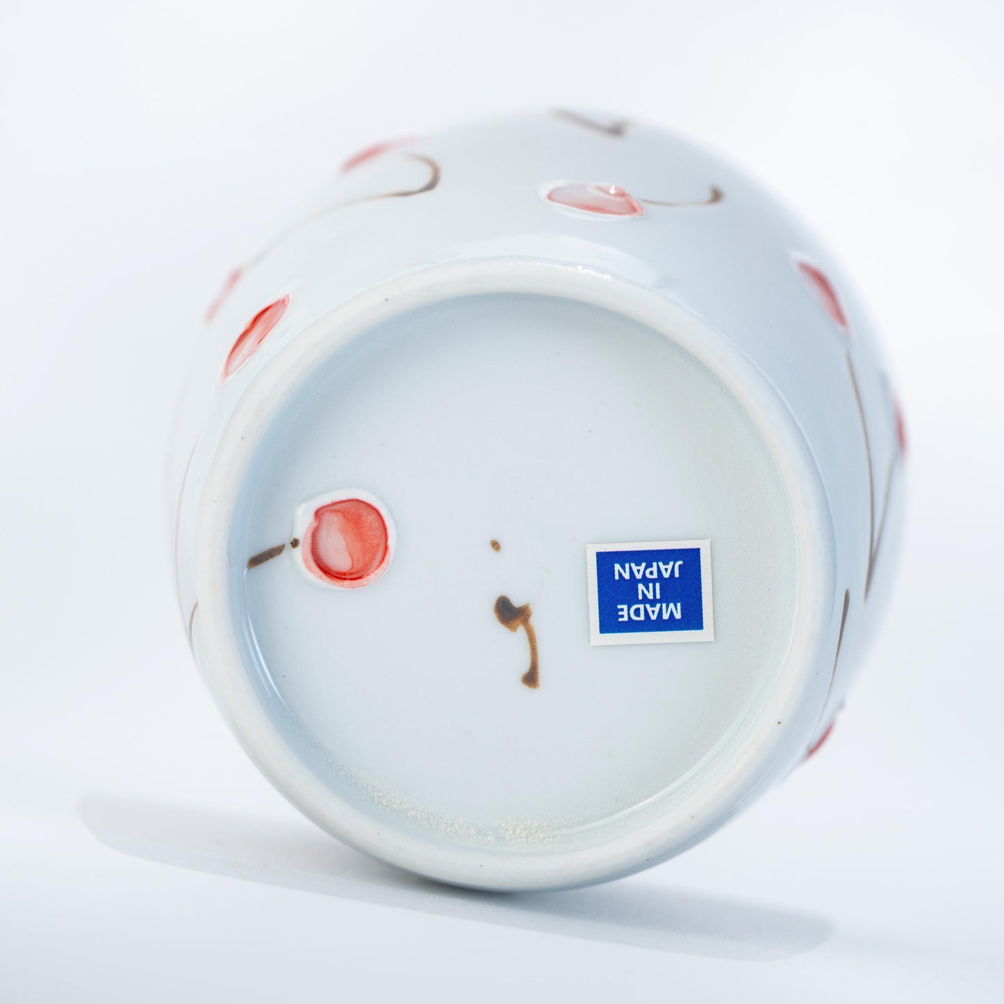 Underside of Arita Hasami yunomi tea cup showing base and foot ring