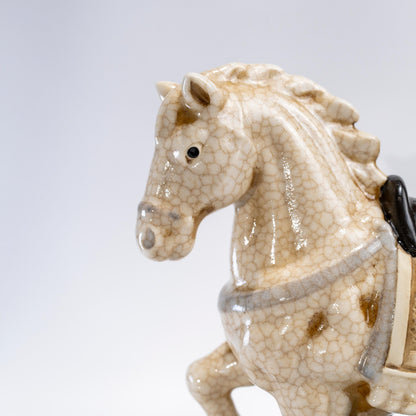 Front detail of crackle glaze finish on zodiac horse figurine