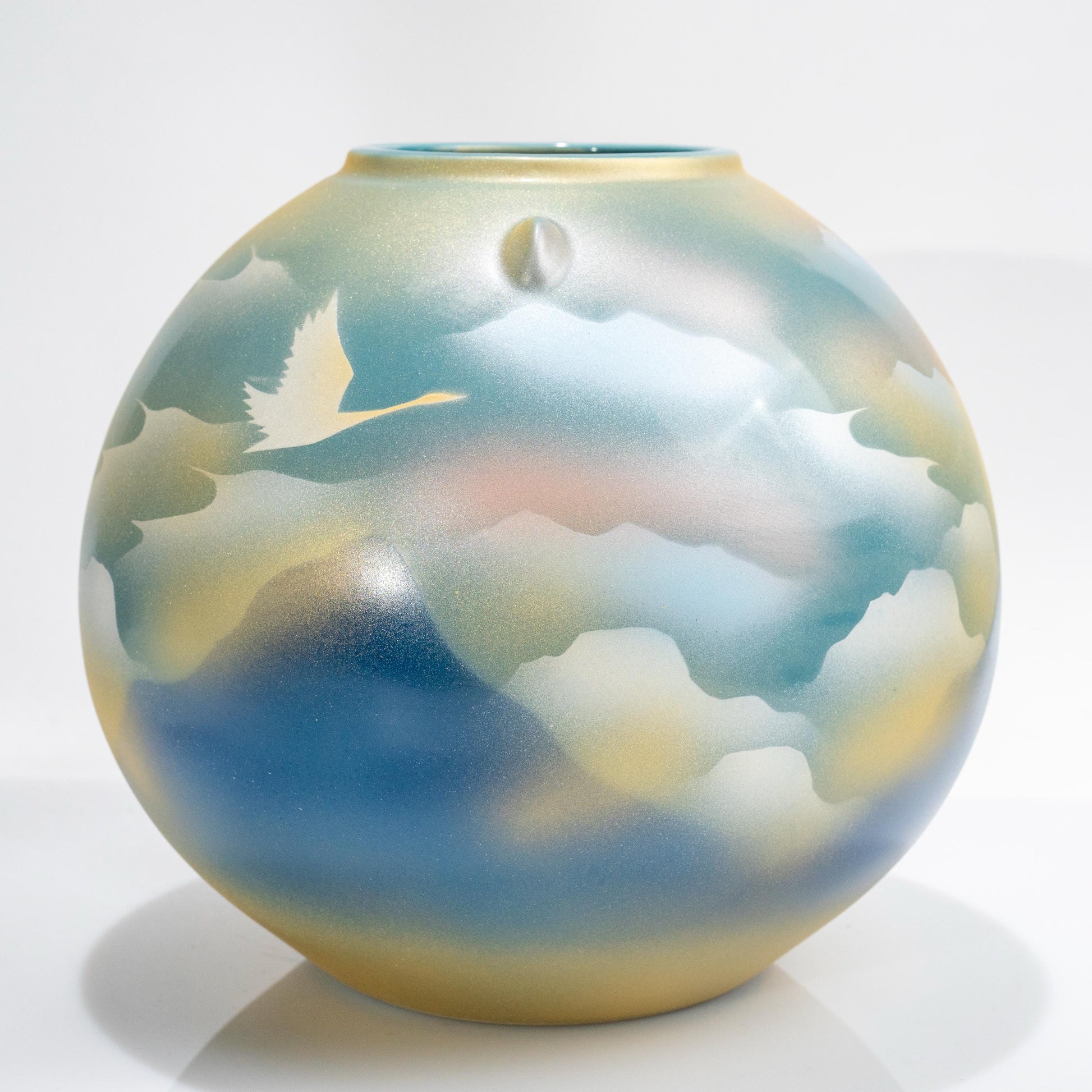 Full view of Kutani round porcelain crane vase on black stand