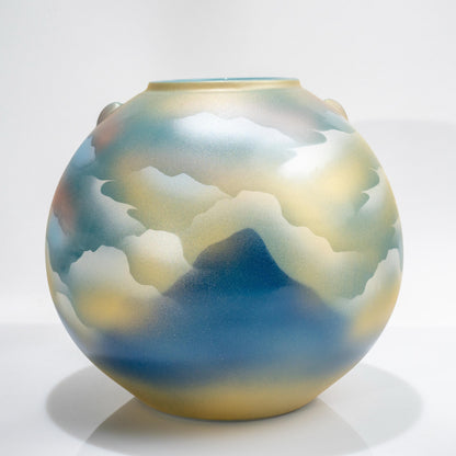 Top angled view of round Kutani crane vase