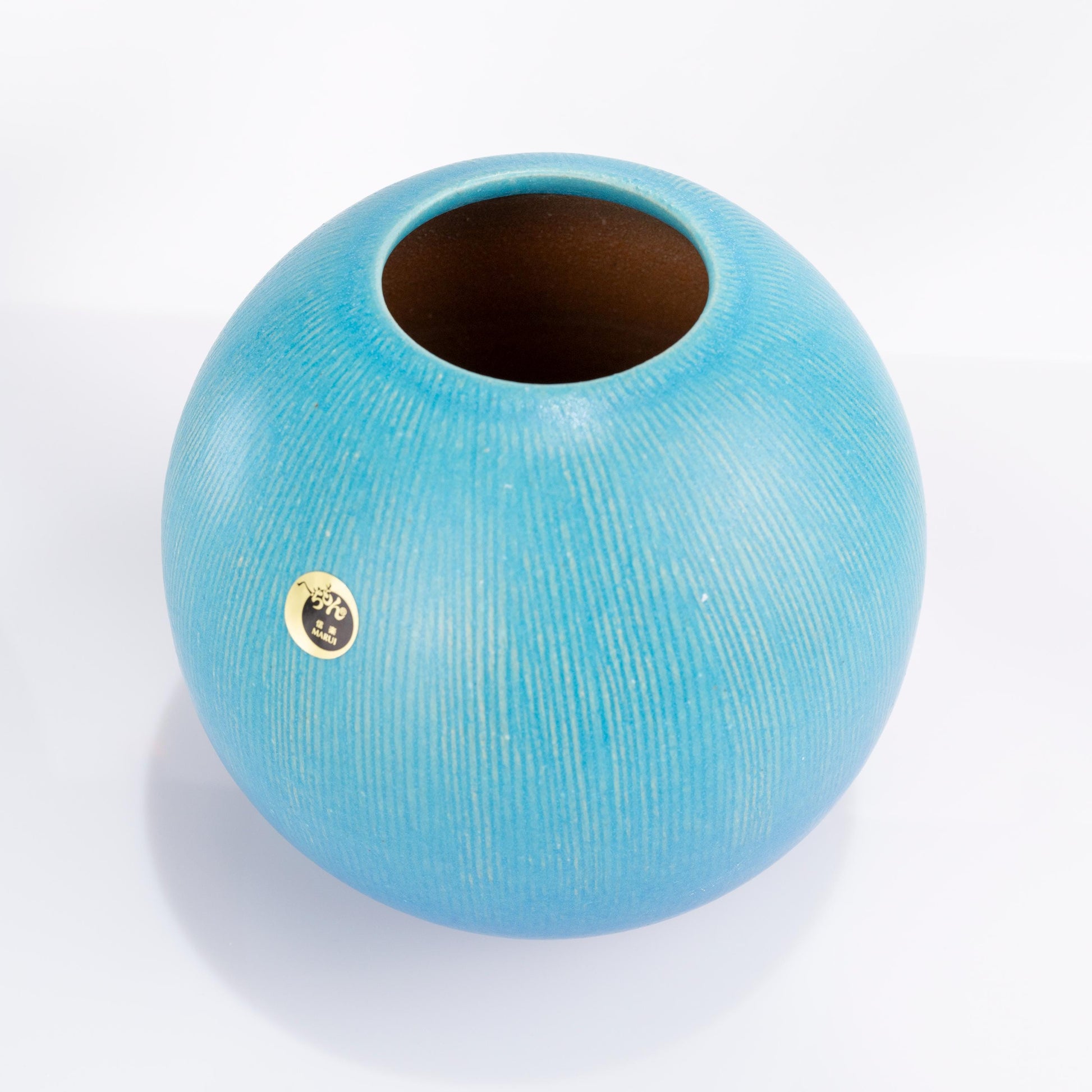 Full view of Shigaraki turquoise ceramic vase for ikebana