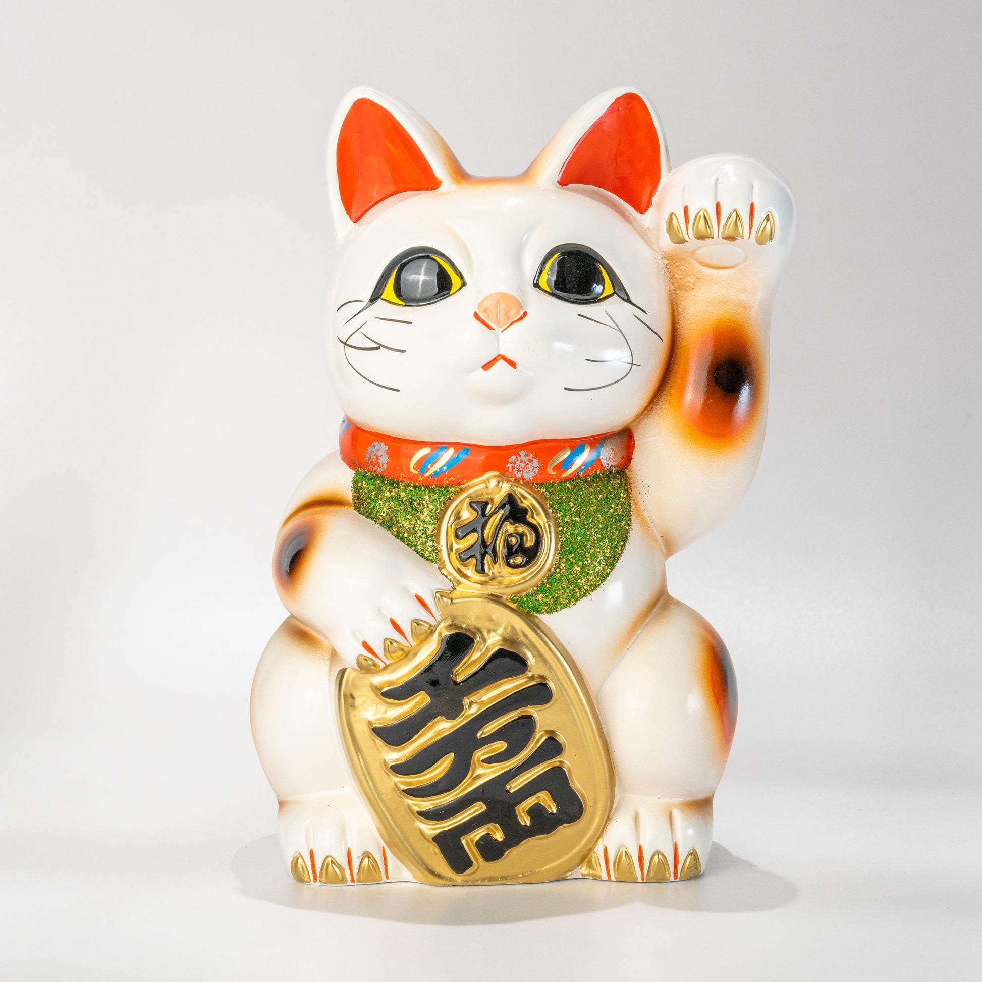 Tokoname Maneki Neko lucky cat statue in white ceramic with left paw raised