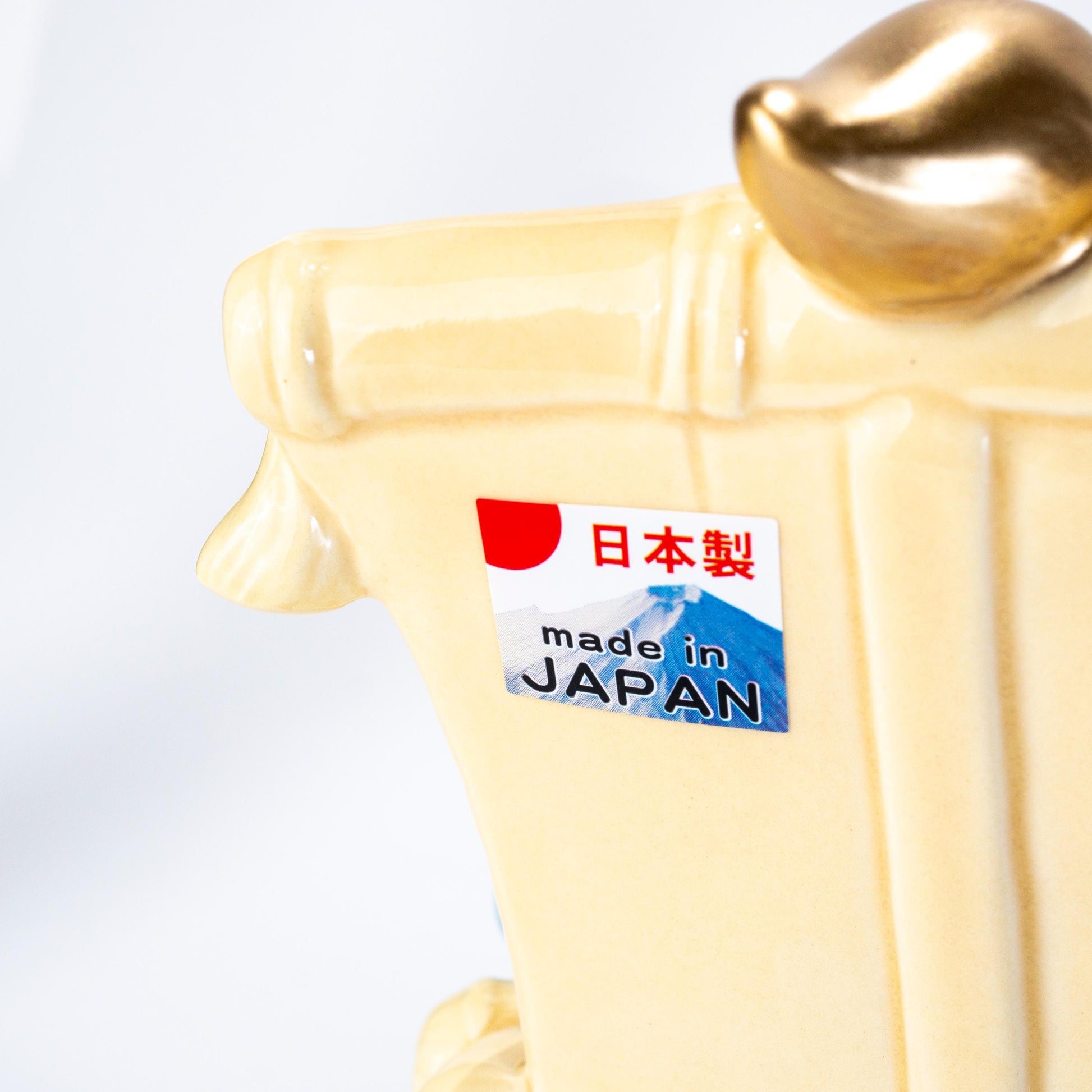 Back detail of treasure ship figurine in Japanese ceramic