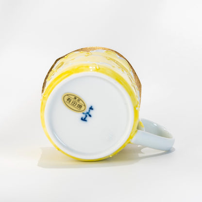 Underside of Arita mug showing base mark