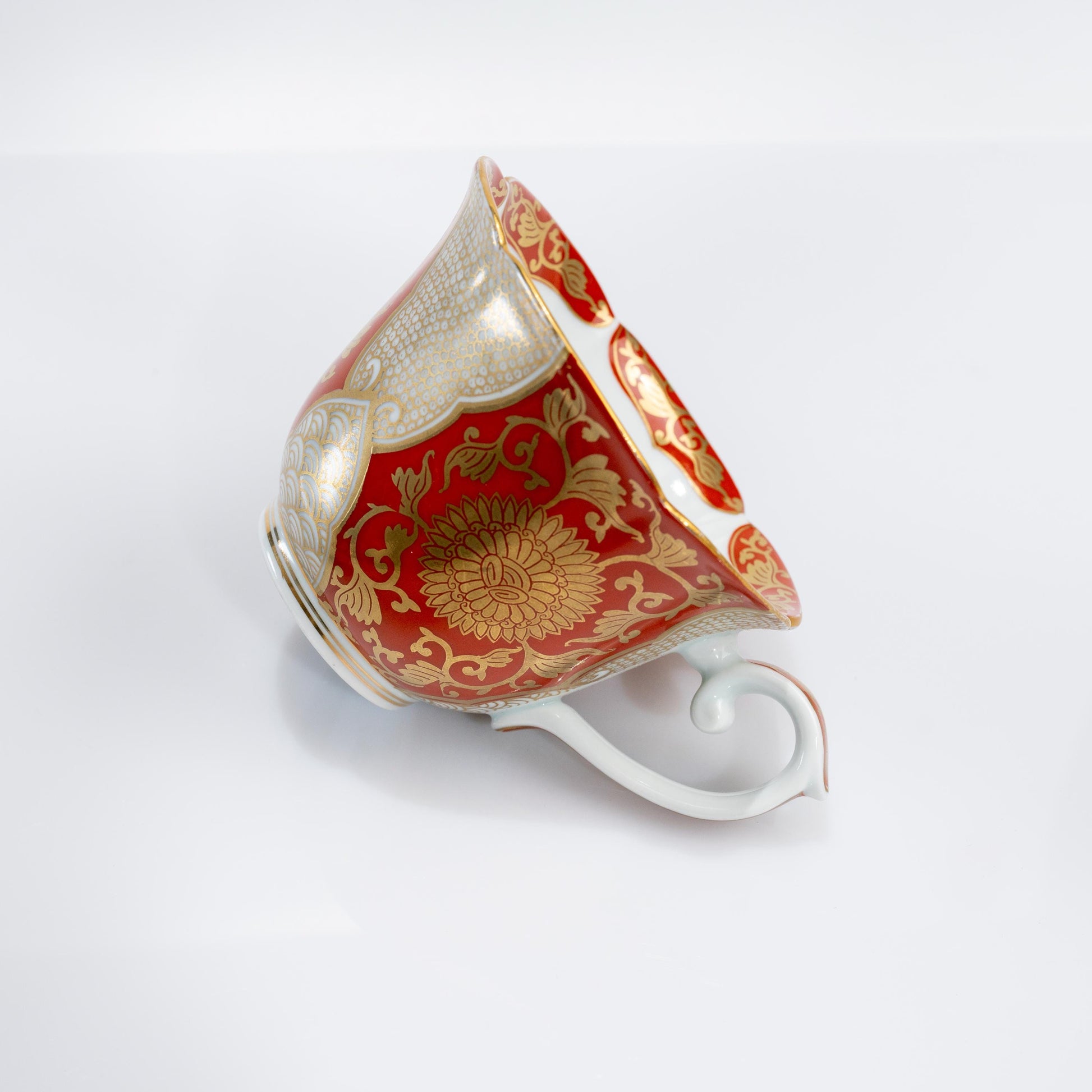 Front view of Japanese cup and saucer set on white background