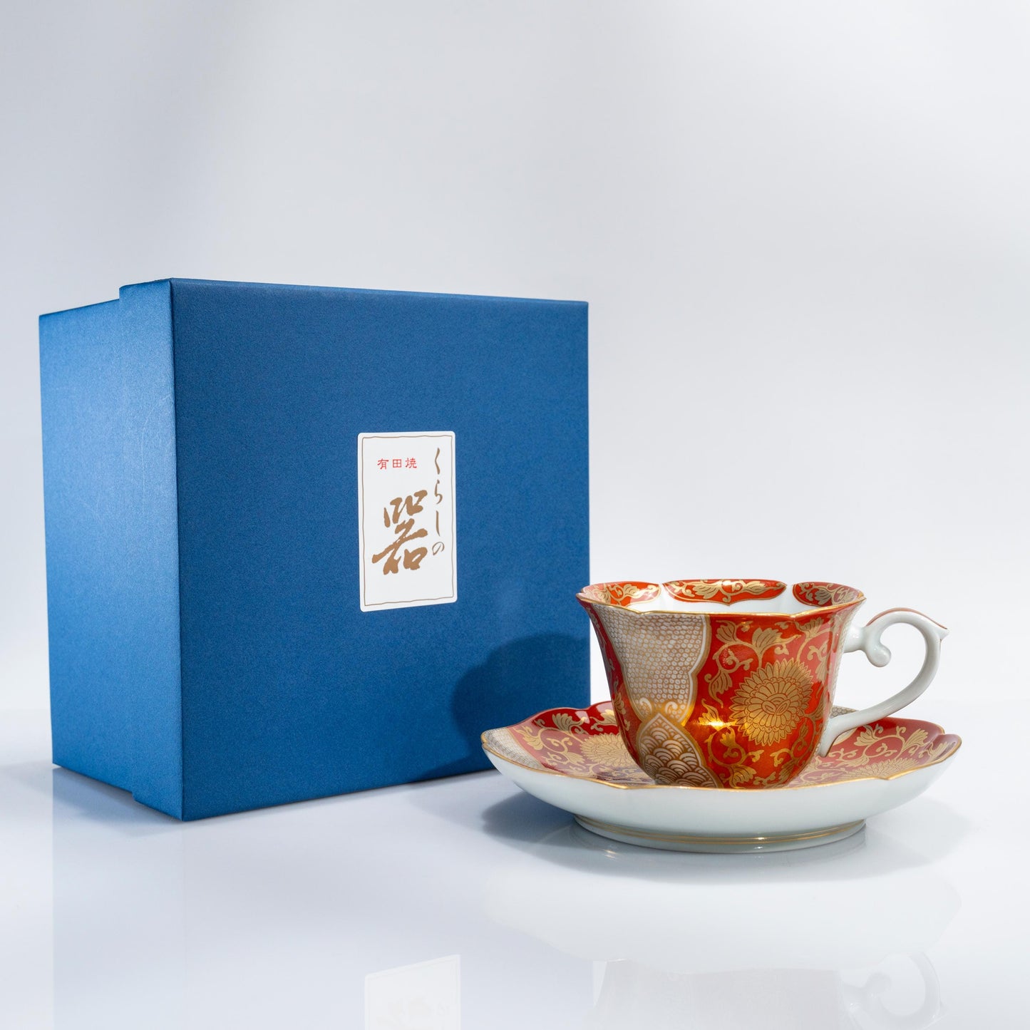 Arita Hasami red gold chrysanthemum cup and saucer set with blue box