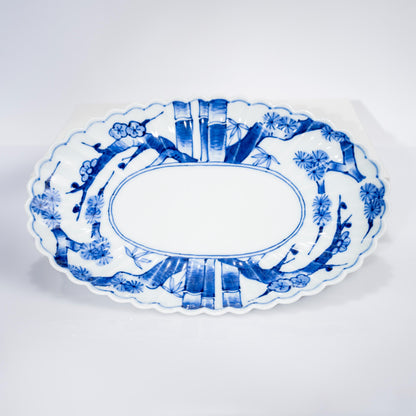 Angled view of blue and white oval serving plate in Arita ware
