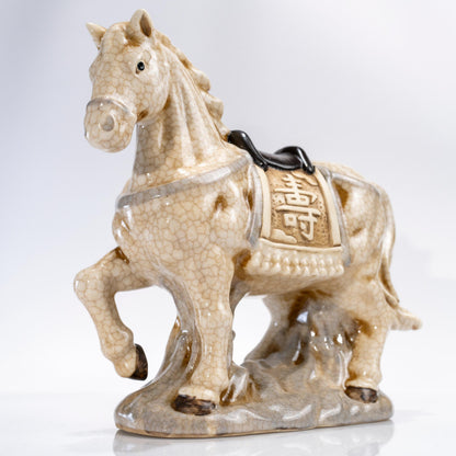 Side view of zodiac horse figurine in ceramic