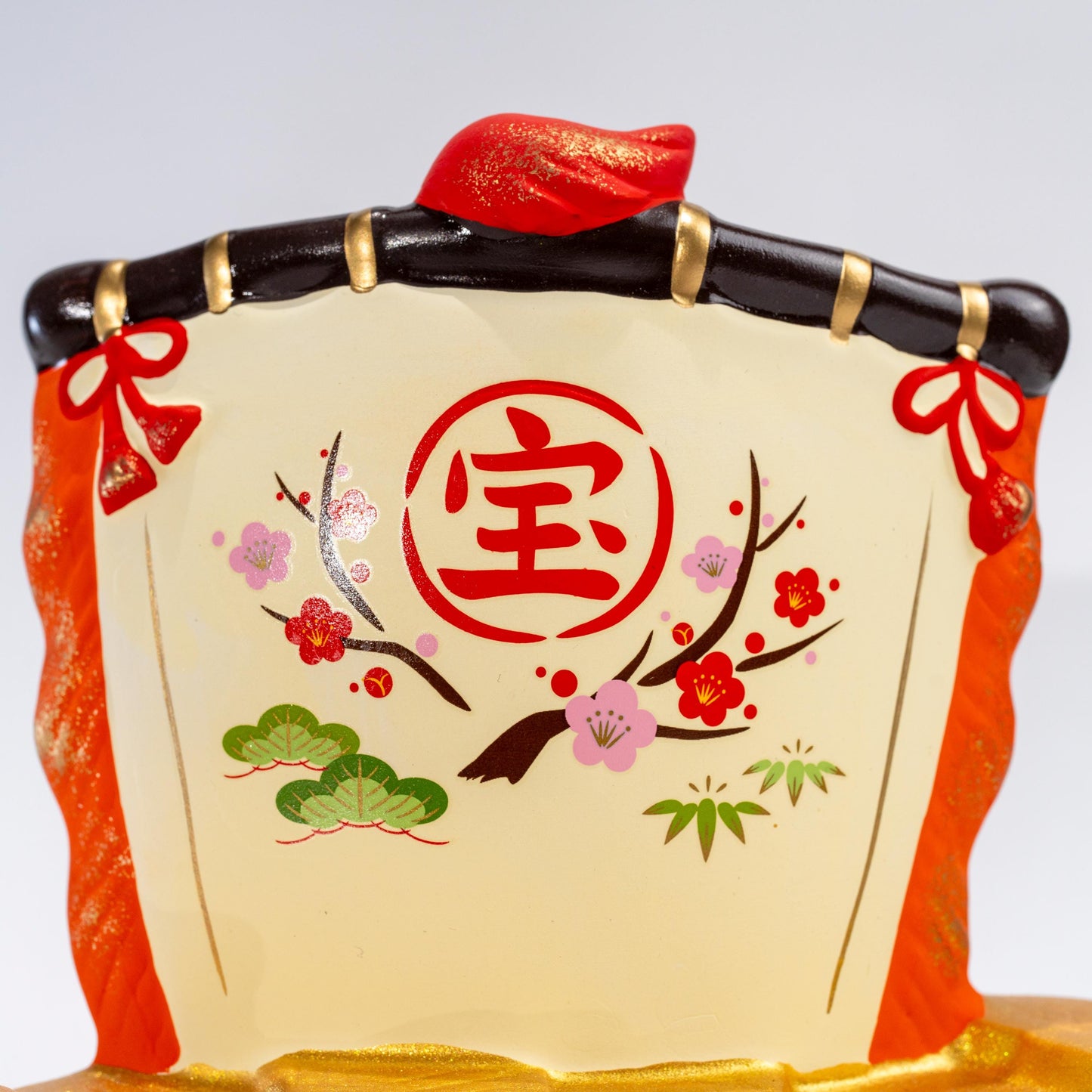 Close-up of the sail detail on a ceramic zodiac treasure boat