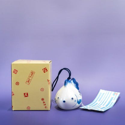 Packaging and insert for ceramic goldfish wind chime