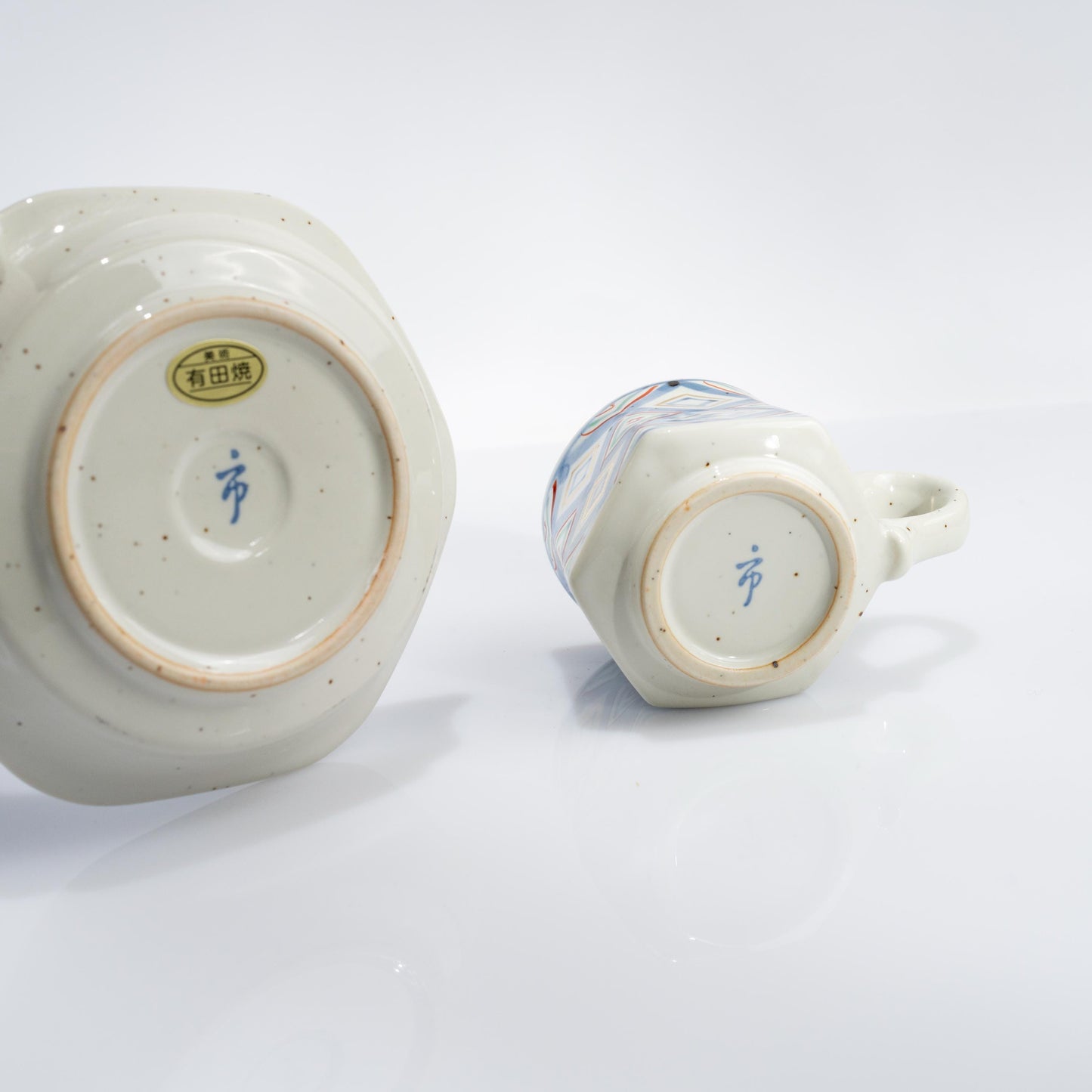 Front view of Japanese porcelain demitasse cup and saucer