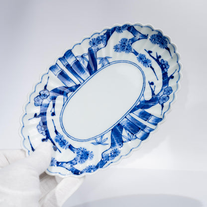 Arita pine bamboo plum oval serving plate in blue and white porcelain
