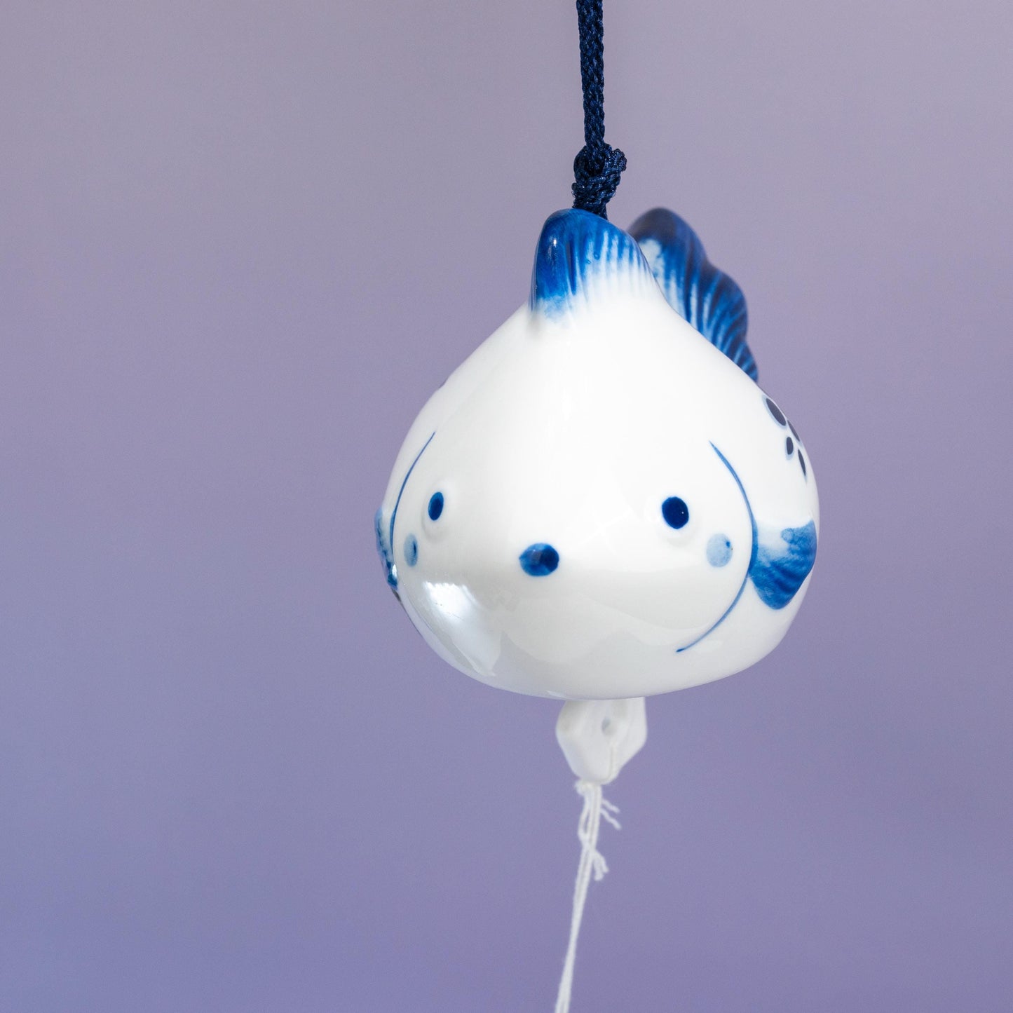 Front detail of ceramic goldfish furin