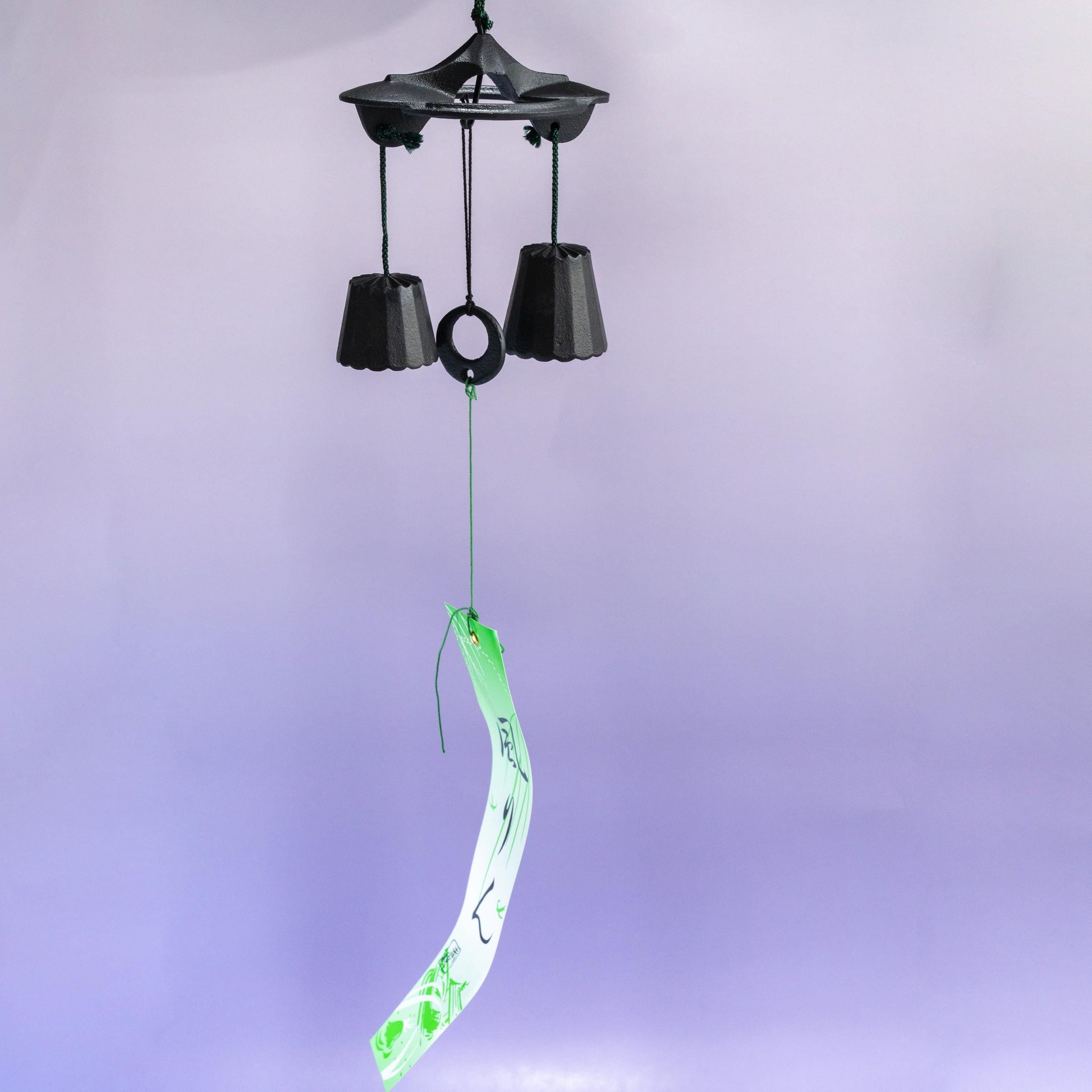 Hanging view of Nambu iron wind chime with paper strip 
