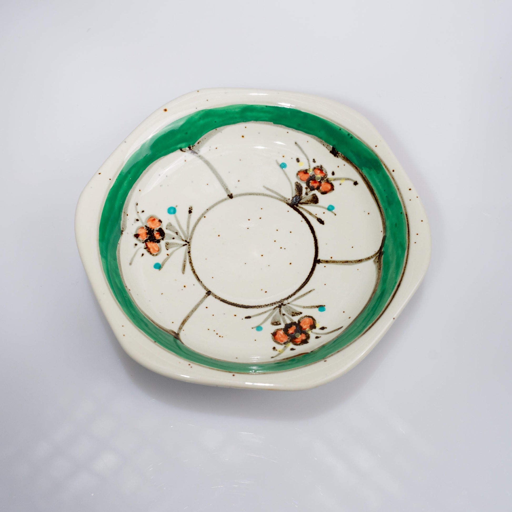 Top view of saucer and cup showing hexagonal form