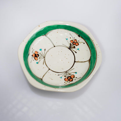 Top view of saucer and cup showing hexagonal form