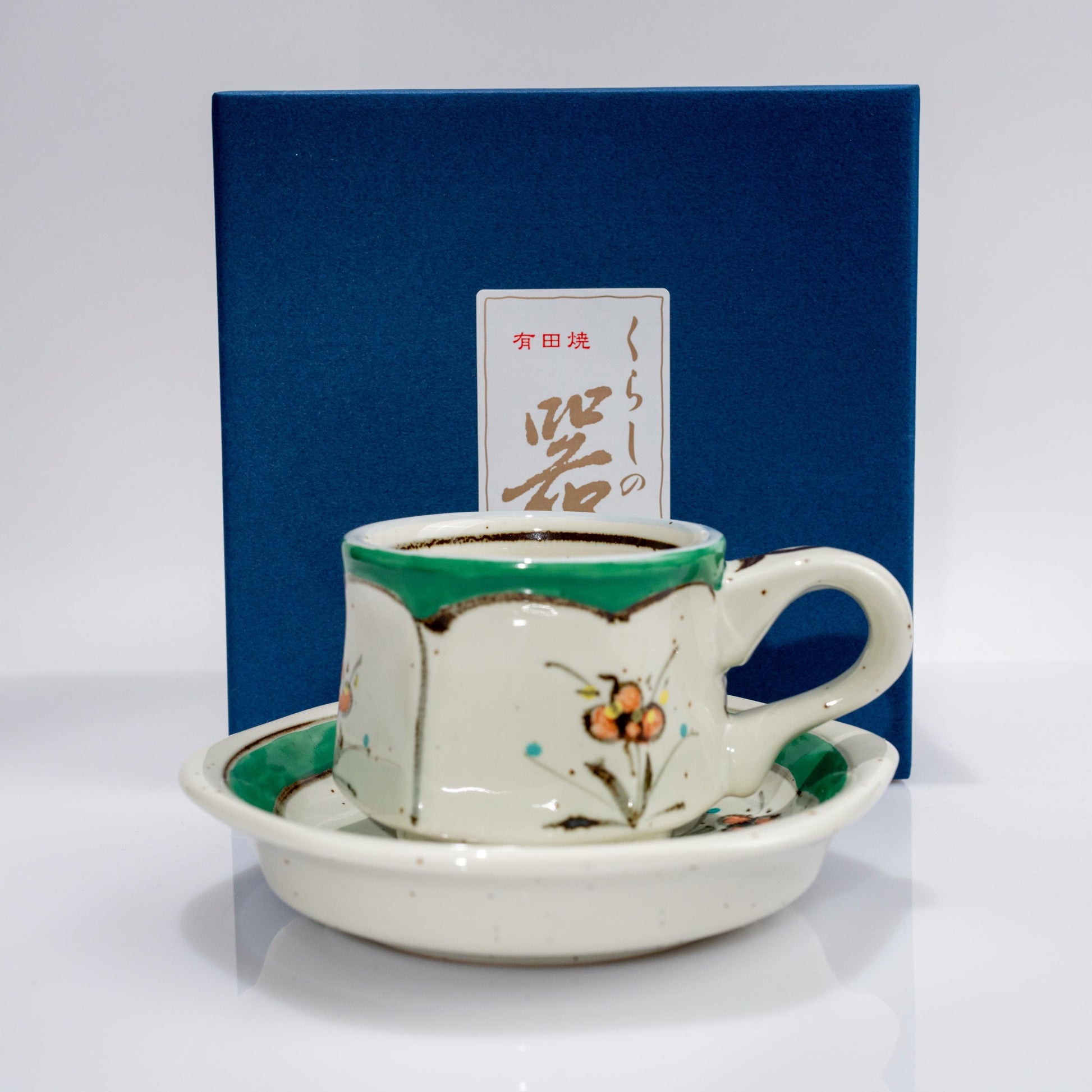 Blue presentation box with Arita demitasse cup and saucer set