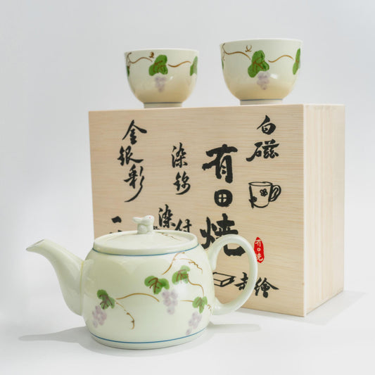 Arita porcelain tea set with grape-vine design: teapot with rabbit lid knob and two sencha cups