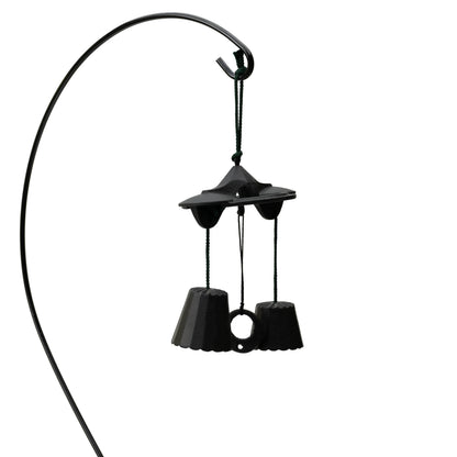 Black Ikenaga double-bell wind chime suspended from a curved display stand.
