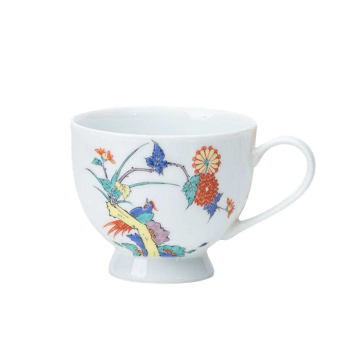 White porcelain cup with chrysanthemums and birds, viewed from the side.