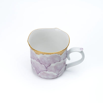 Top view into the purple peony mug and its white interior.
