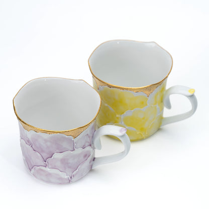 Yellow and purple peony mugs shown together for color comparison.