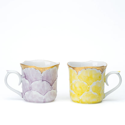 Purple and yellow peony mugs side by side for color comparison.