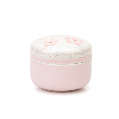 Side view of the closed pink cherry blossom box.