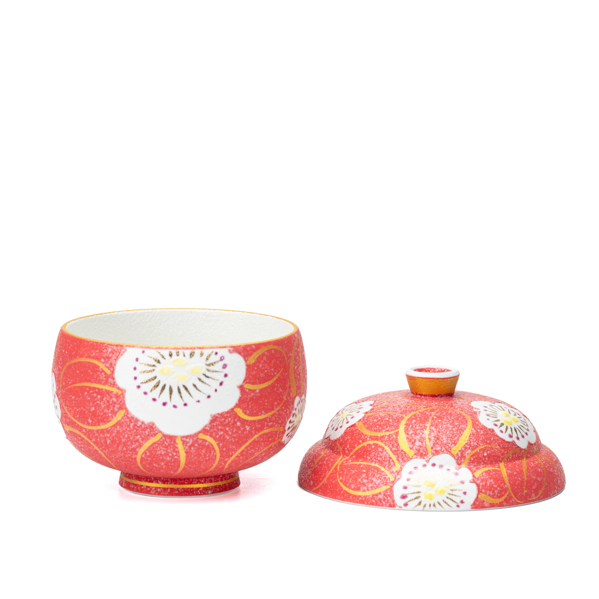 Red floral bowl with its knobbed lid placed beside it.