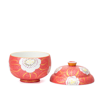 Red floral bowl with its knobbed lid placed beside it.