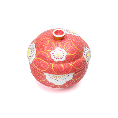 Red floral bowl and lid viewed from above.