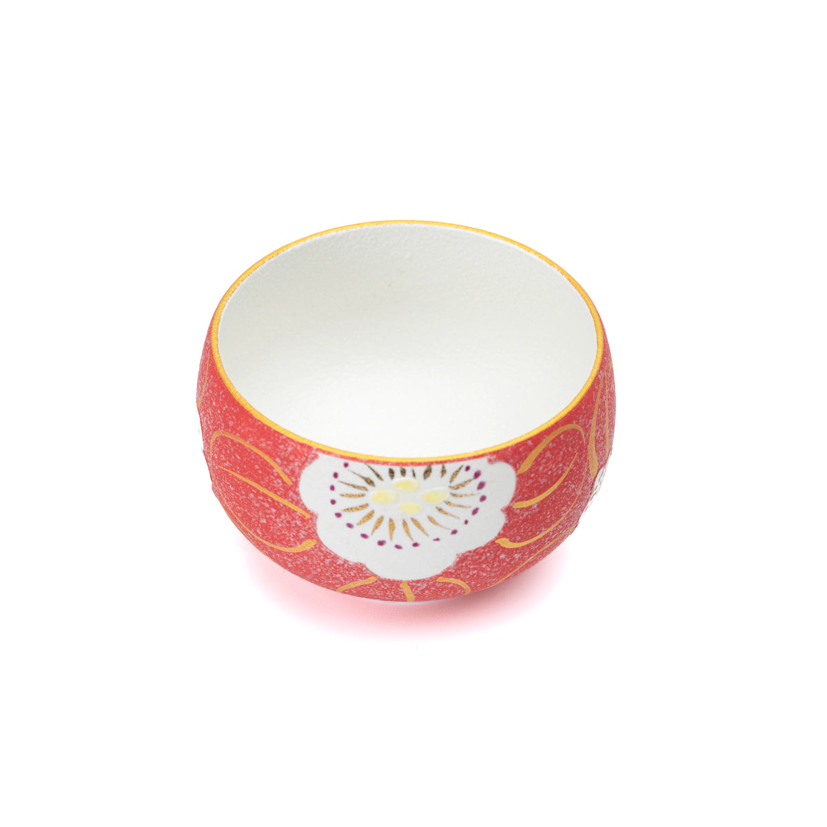 Open red floral bowl showing its white interior.