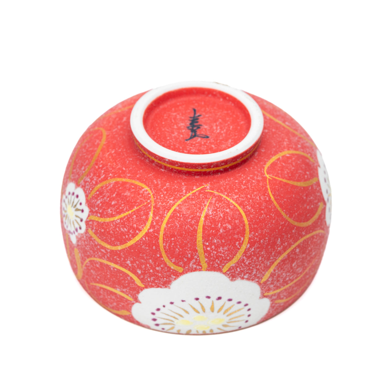 Underside of the red floral bowl with a blue maker's mark.