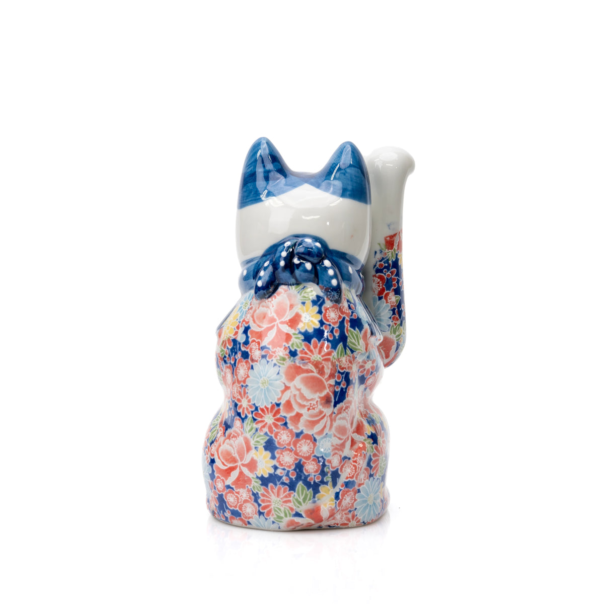 Back of the blue floral lucky cat and its blue bow.