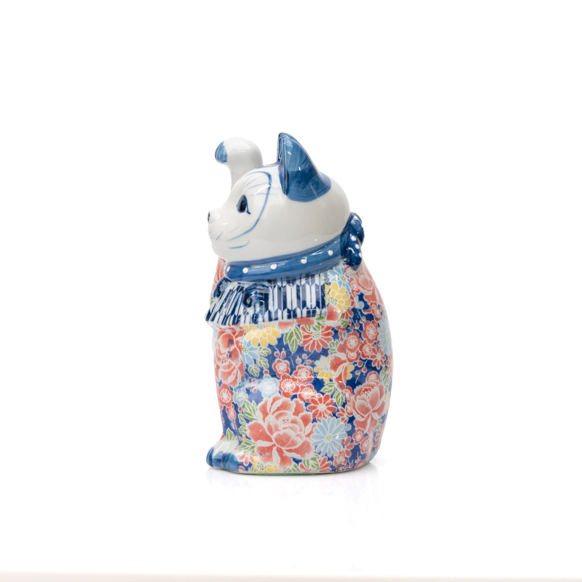 Side view of the blue floral lucky cat and blue collar.